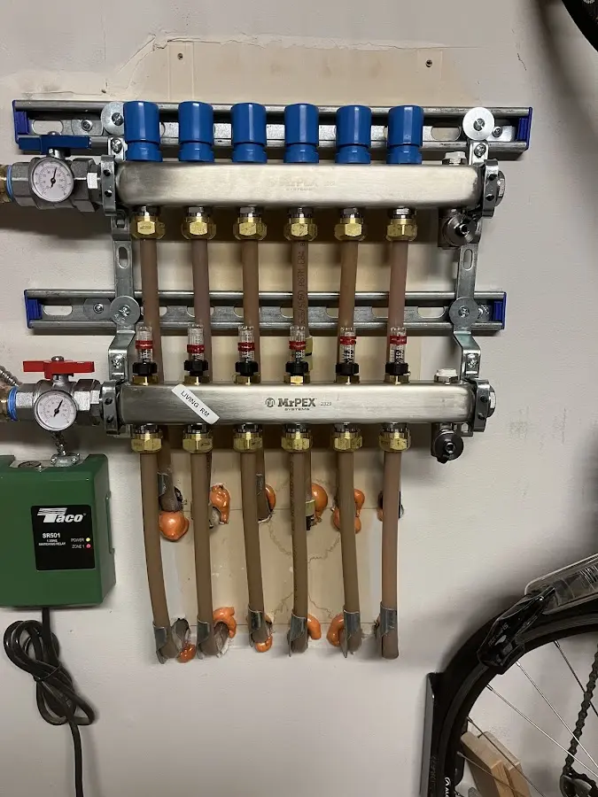 Plumber performing Water Heater Repair at a residential property in East Rancho Dominguez